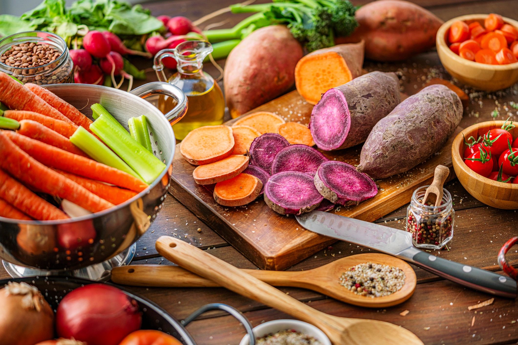 Freshly harvested root vegetables on a cutting board