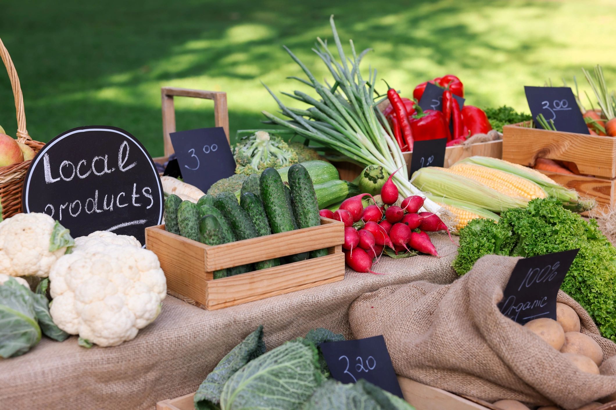 Assorted vegetables at a farmers market stall