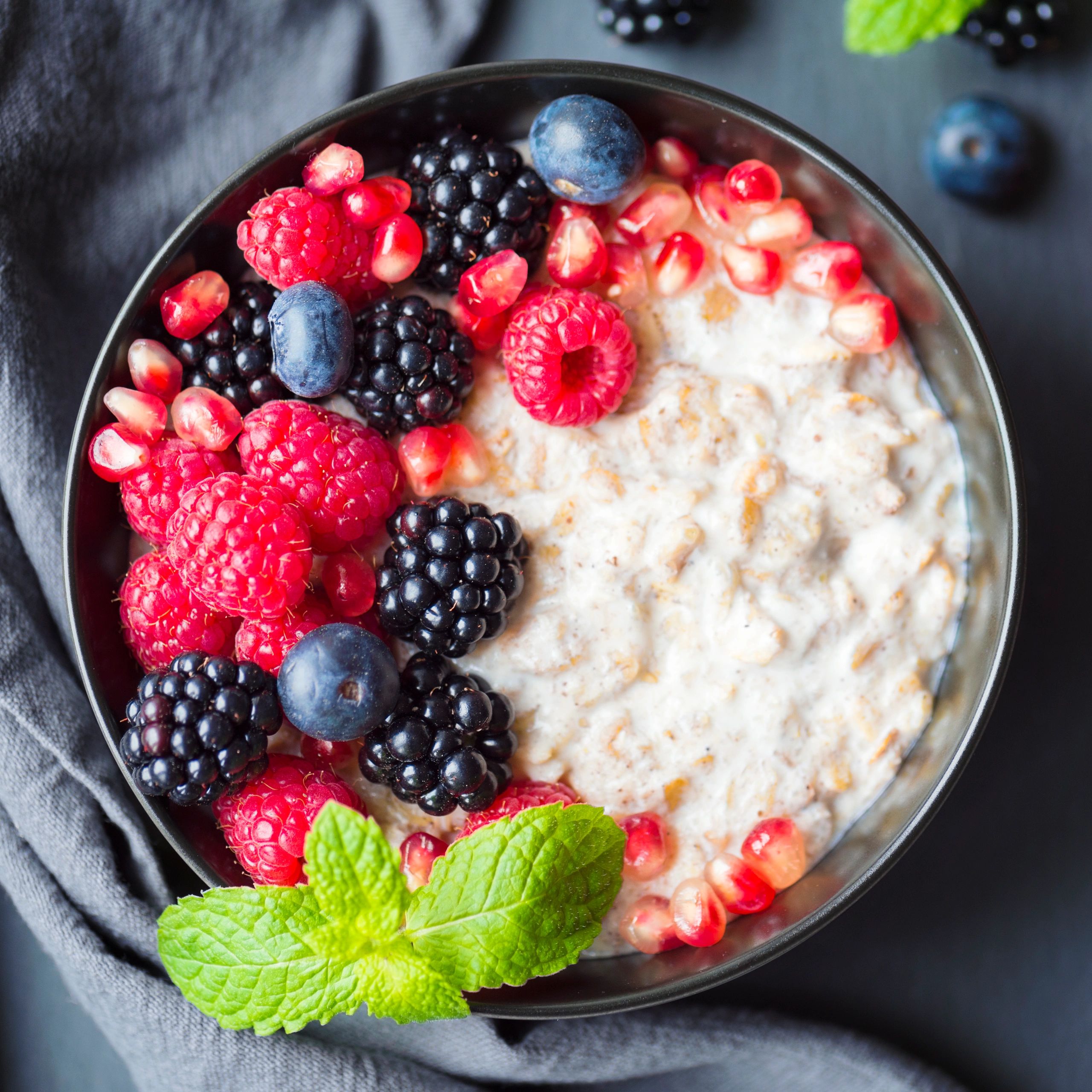 Bowl of berries on breakfast porridge
